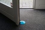 Door stop DOORSTOPPER, plastic door barrier, floor, mixed colors, Sellbox 24 pcs
