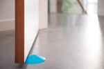 Door stop DOORSTOPPER, plastic door barrier, floor, mixed colors, Sellbox 24 pcs