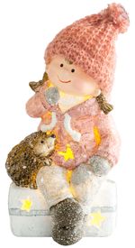 Figura MagicHome Karácsonyi, Kislány sámlin ülve sündisznóval, 1 LED, polirezin, 10,5x10,5x19,5 cm