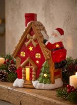 Decoration MagicHome Christmas, House with Santa on the roof, LED, terracotta, 2xAAA, 27x13x34 cm