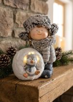 Dekorácia MagicHome Vianoce, dievča so snehovou guľou a tučniakom, LED, 19.5x28x33.5 cm